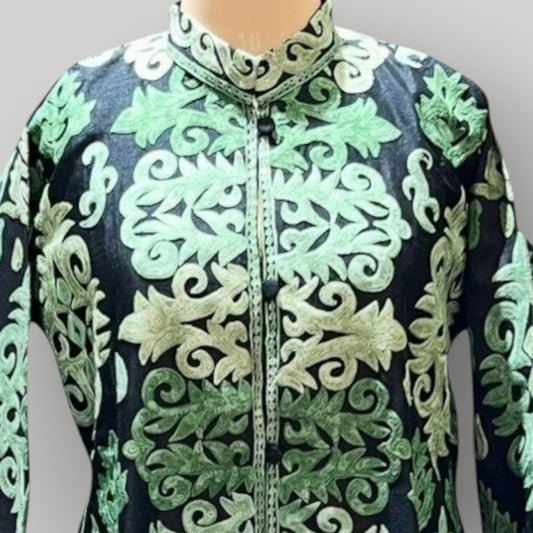 Pashm Home black and green cashmere silk jacket with intricate Ari embroidery and a high neckline.